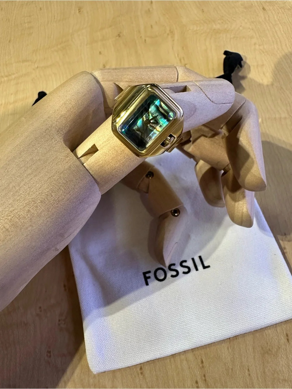 Fossil gold tone